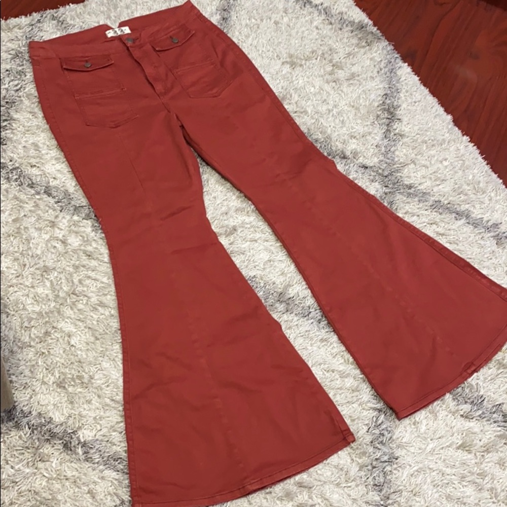 Free people, we the free rust flare leg hi rise denim sz 33